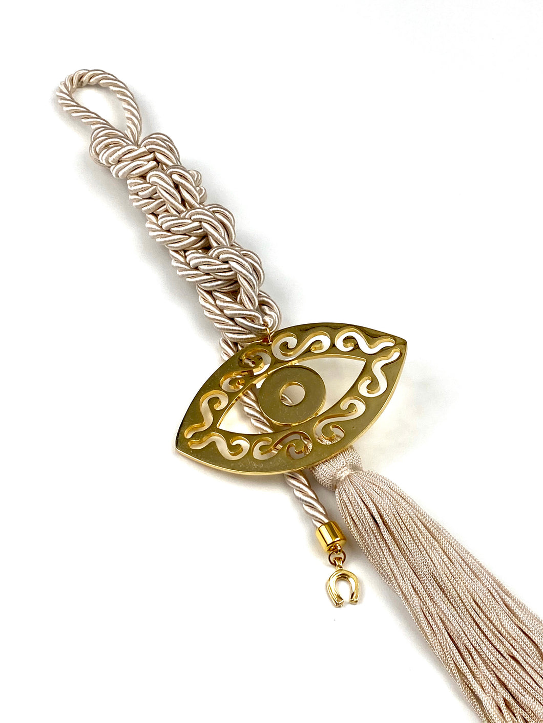 Large Polished Metal Evil Eye Gouri on Champagne Double Corded Braid with Long Tassel