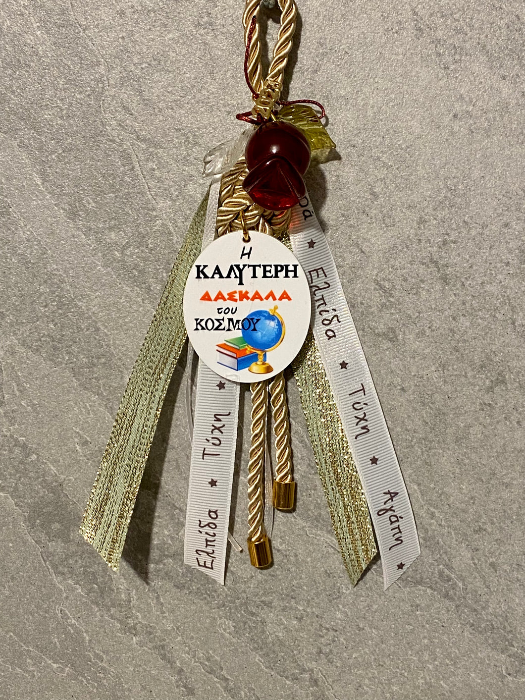 For “The Best Teacher” Gouri with Glass Pomegranate and Greek Ribbons  G233444