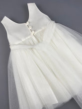 Load image into Gallery viewer, Dress 55 Girls Baptismal Christening Sleeveless Dress with new Silver Glitter, French lace across the chest, accented with Pearl flowers, matching Bolero and Hat. Made in Greece exclusively for Rosies Collections.
