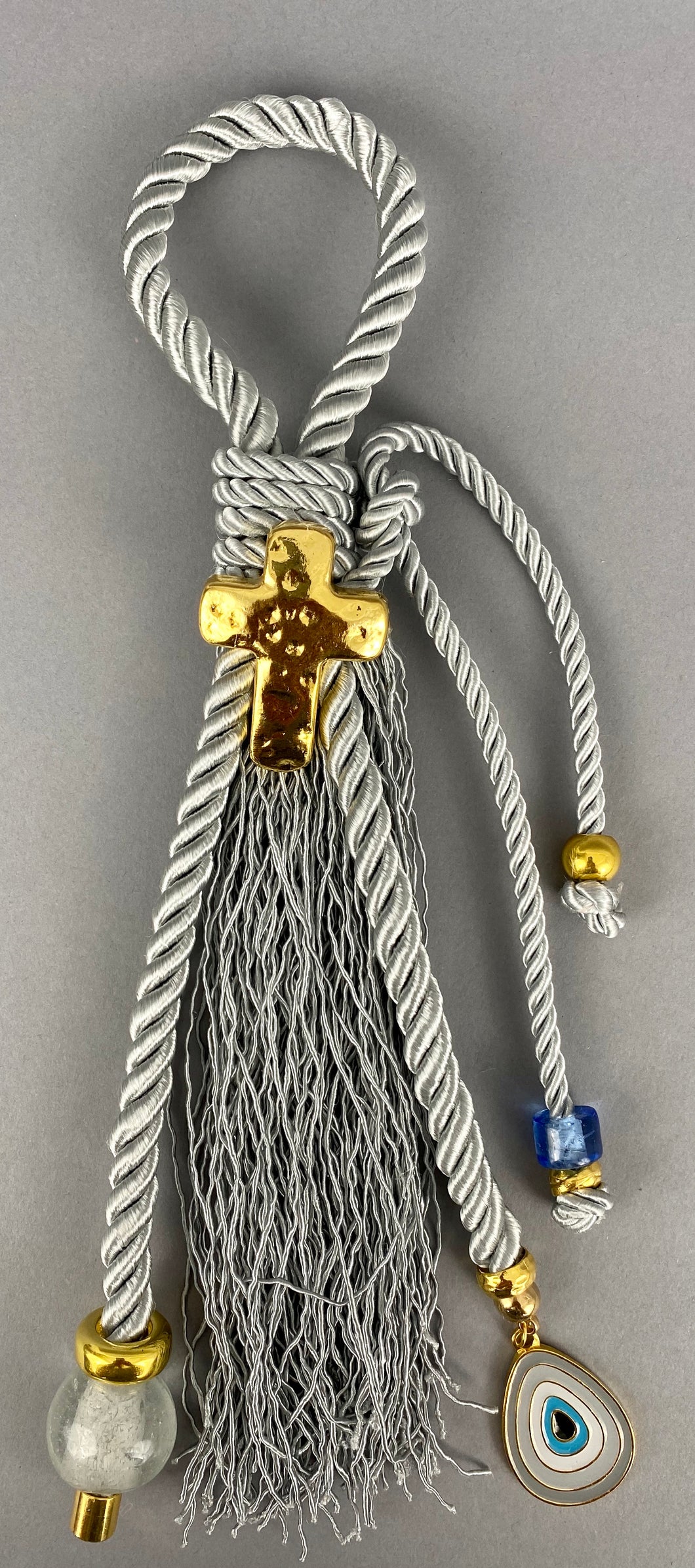Gouri 1015 Pearl Grey Cord Gouri, large Metal  Cross, Metal Mati,  large Murano Glass Bead.  Measures 14” in length.