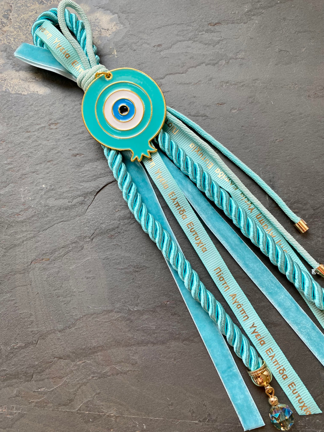 Good Luck Gouri with Metal Mati Pomegranate on Teal Rope with Greek Ribbons and Charm GG202311